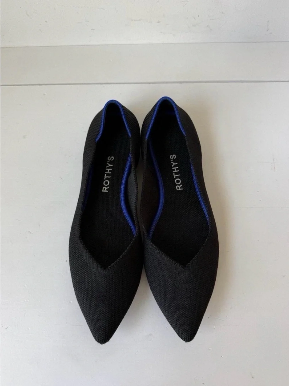 Rothy's Black Pointed Knit Flats with Blue Trim